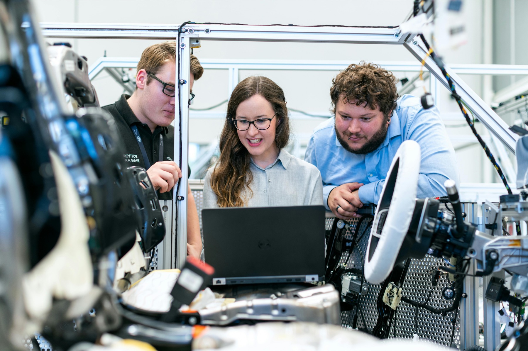 Engineers reviewing an automotive system